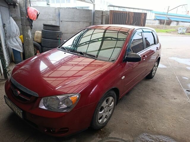 Красный Киа Черато, объемом двигателя 1.6 л и пробегом 230 тыс. км за 4400 $, фото 4 на Automoto.ua