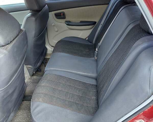 Червоний Кіа Черато, об'ємом двигуна 1.6 л та пробігом 120 тис. км за 4300 $, фото 10 на Automoto.ua