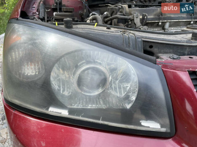 Червоний Кіа Черато, об'ємом двигуна 1.6 л та пробігом 340 тис. км за 2500 $, фото 8 на Automoto.ua