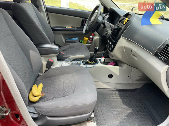 Червоний Кіа Черато, об'ємом двигуна 1.6 л та пробігом 340 тис. км за 2500 $, фото 13 на Automoto.ua