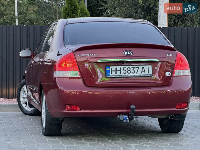 Красный Киа Черато, объемом двигателя 1.98 л и пробегом 180 тыс. км за 5600 $, фото 15 на Automoto.ua