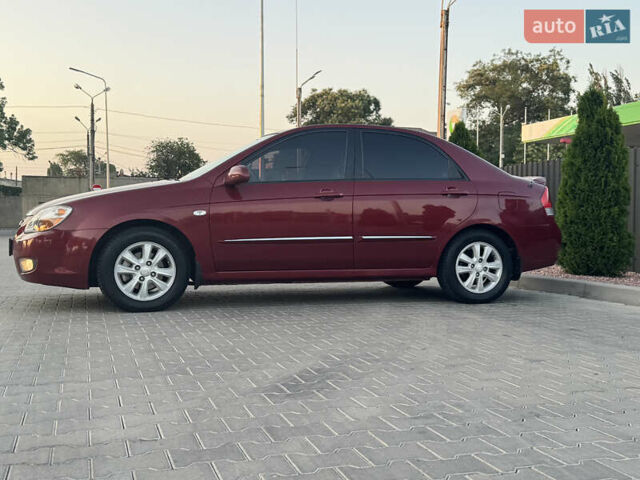 Красный Киа Черато, объемом двигателя 1.98 л и пробегом 180 тыс. км за 5600 $, фото 1 на Automoto.ua