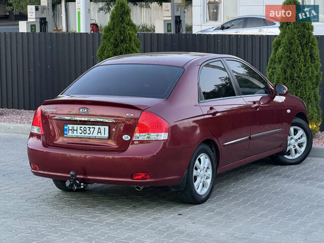 Красный Киа Черато, объемом двигателя 1.98 л и пробегом 180 тыс. км за 5600 $, фото 17 на Automoto.ua