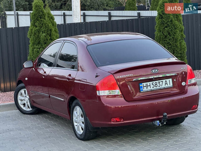 Красный Киа Черато, объемом двигателя 1.98 л и пробегом 180 тыс. км за 5600 $, фото 14 на Automoto.ua