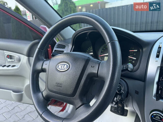 Красный Киа Черато, объемом двигателя 1.98 л и пробегом 180 тыс. км за 5600 $, фото 33 на Automoto.ua