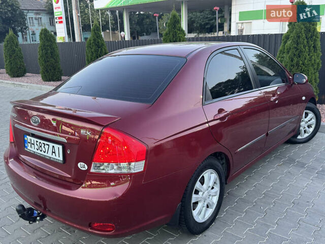 Красный Киа Черато, объемом двигателя 1.98 л и пробегом 180 тыс. км за 5600 $, фото 19 на Automoto.ua