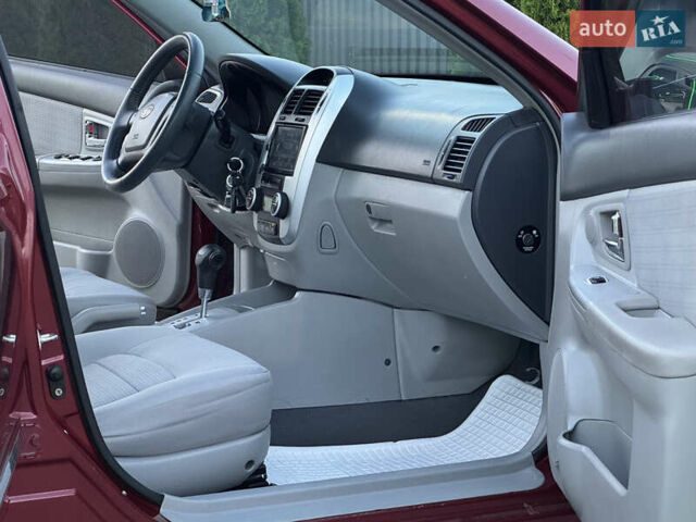 Красный Киа Черато, объемом двигателя 1.98 л и пробегом 180 тыс. км за 5600 $, фото 21 на Automoto.ua