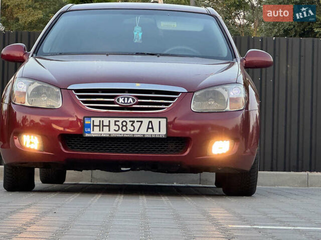 Красный Киа Черато, объемом двигателя 1.98 л и пробегом 180 тыс. км за 5600 $, фото 4 на Automoto.ua