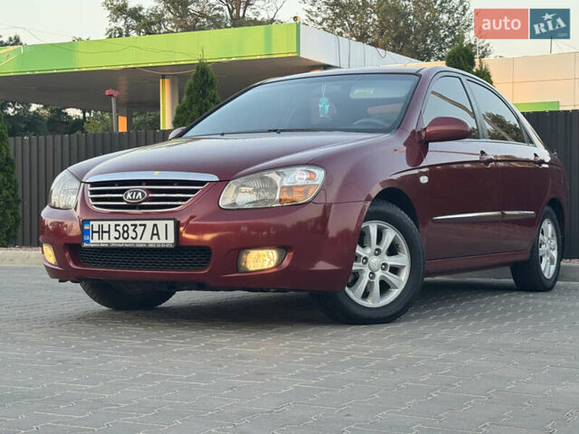 Красный Киа Черато, объемом двигателя 1.98 л и пробегом 180 тыс. км за 5600 $, фото 2 на Automoto.ua
