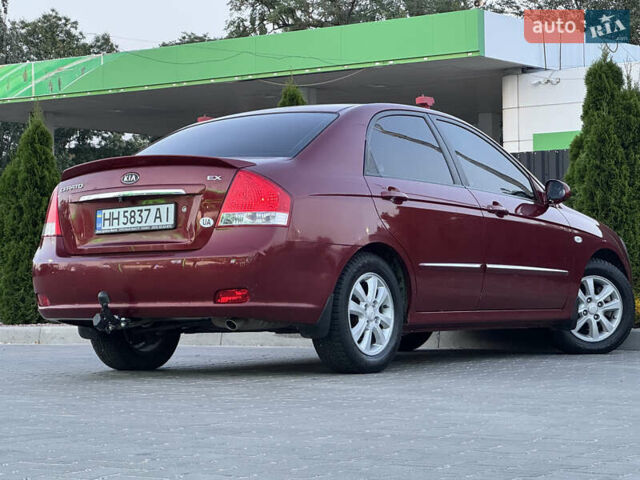 Красный Киа Черато, объемом двигателя 1.98 л и пробегом 180 тыс. км за 5600 $, фото 16 на Automoto.ua