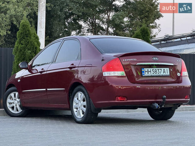 Красный Киа Черато, объемом двигателя 1.98 л и пробегом 180 тыс. км за 5600 $, фото 13 на Automoto.ua