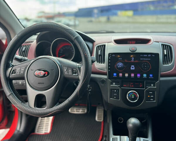 Красный Киа Черато, объемом двигателя 2 л и пробегом 146 тыс. км за 10000 $, фото 7 на Automoto.ua