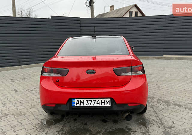 Червоний Кіа Черато, об'ємом двигуна 2 л та пробігом 140 тис. км за 7800 $, фото 4 на Automoto.ua
