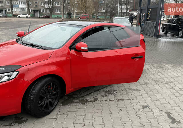 Червоний Кіа Черато, об'ємом двигуна 2 л та пробігом 140 тис. км за 7800 $, фото 6 на Automoto.ua