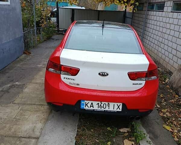 Червоний Кіа Черато, об'ємом двигуна 2 л та пробігом 177 тис. км за 4500 $, фото 2 на Automoto.ua