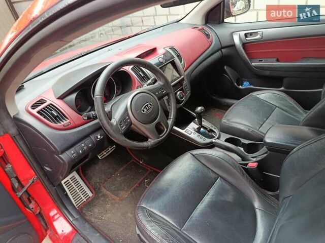 Червоний Кіа Черато, об'ємом двигуна 2 л та пробігом 177 тис. км за 4500 $, фото 6 на Automoto.ua