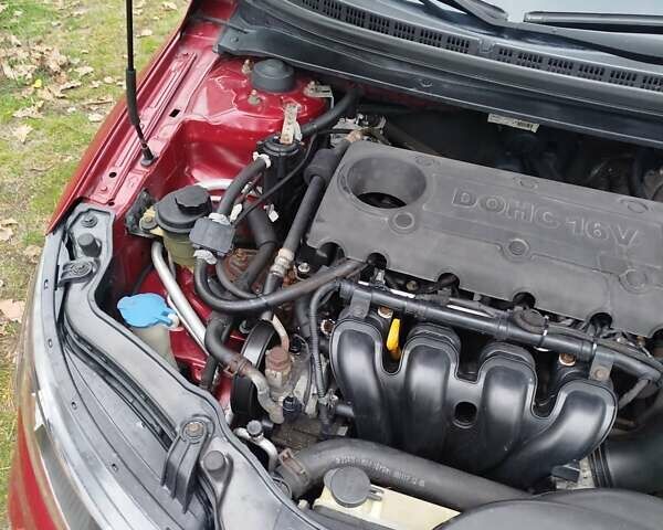 Червоний Кіа Черато, об'ємом двигуна 2 л та пробігом 345 тис. км за 6800 $, фото 9 на Automoto.ua