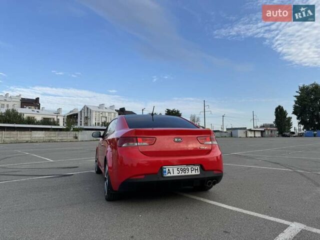 Красный Киа Черато, объемом двигателя 2 л и пробегом 219 тыс. км за 8200 $, фото 4 на Automoto.ua