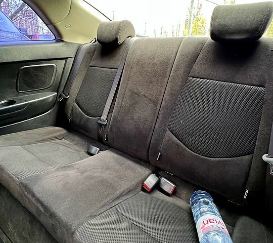 Красный Киа Черато, объемом двигателя 1.6 л и пробегом 128 тыс. км за 6700 $, фото 12 на Automoto.ua