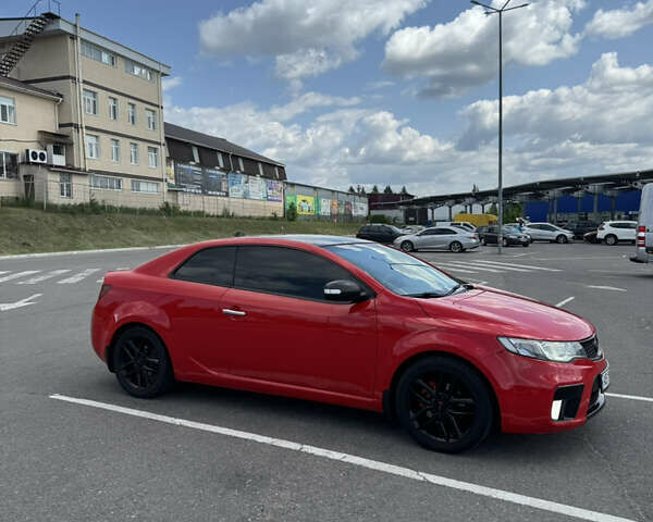 Красный Киа Черато, объемом двигателя 2 л и пробегом 146 тыс. км за 10000 $, фото 3 на Automoto.ua