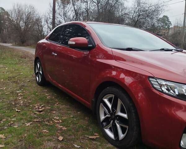Червоний Кіа Черато, об'ємом двигуна 2 л та пробігом 345 тис. км за 6800 $, фото 2 на Automoto.ua