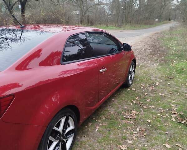 Червоний Кіа Черато, об'ємом двигуна 2 л та пробігом 345 тис. км за 6800 $, фото 6 на Automoto.ua