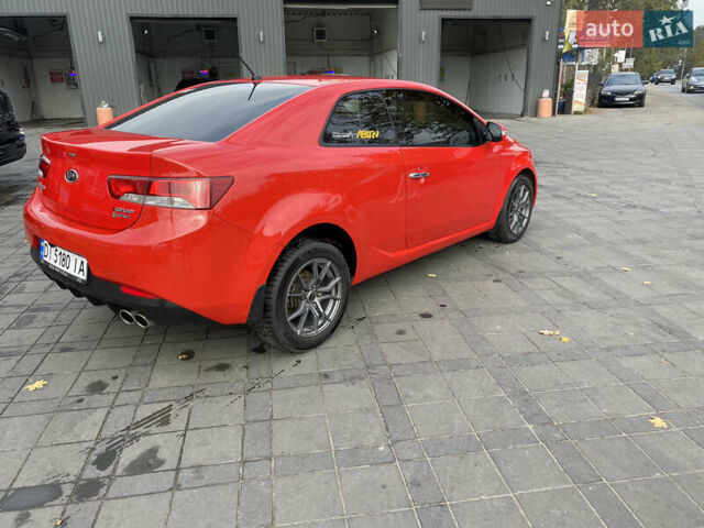 Красный Киа Черато, объемом двигателя 2 л и пробегом 110 тыс. км за 8200 $, фото 4 на Automoto.ua