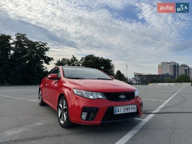 Красный Киа Черато, объемом двигателя 2 л и пробегом 219 тыс. км за 8200 $, фото 1 на Automoto.ua
