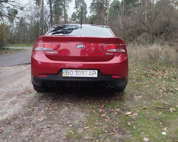Червоний Кіа Черато, об'ємом двигуна 2 л та пробігом 345 тис. км за 6800 $, фото 3 на Automoto.ua