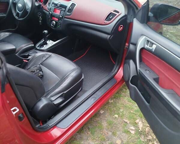 Червоний Кіа Черато, об'ємом двигуна 2 л та пробігом 345 тис. км за 6800 $, фото 5 на Automoto.ua