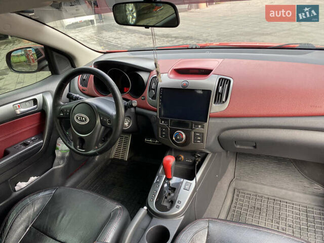Красный Киа Черато, объемом двигателя 2 л и пробегом 110 тыс. км за 8200 $, фото 8 на Automoto.ua