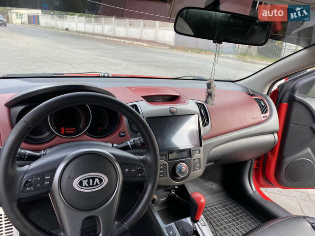 Красный Киа Черато, объемом двигателя 2 л и пробегом 110 тыс. км за 8200 $, фото 10 на Automoto.ua