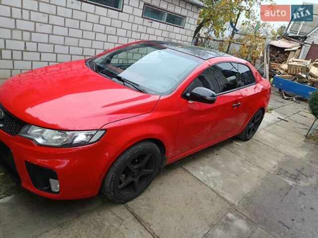 Червоний Кіа Черато, об'ємом двигуна 2 л та пробігом 177 тис. км за 4500 $, фото 1 на Automoto.ua