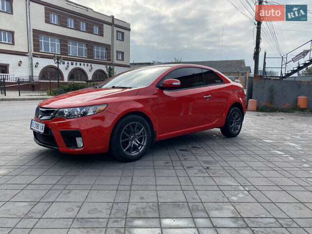 Красный Киа Черато, объемом двигателя 2 л и пробегом 110 тыс. км за 8200 $, фото 1 на Automoto.ua
