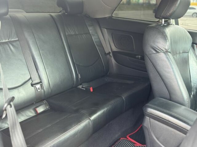 Красный Киа Черато, объемом двигателя 2 л и пробегом 146 тыс. км за 8000 $, фото 7 на Automoto.ua