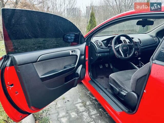 Красный Киа Черато, объемом двигателя 1.6 л и пробегом 293 тыс. км за 7100 $, фото 9 на Automoto.ua