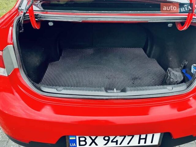 Красный Киа Черато, объемом двигателя 1.6 л и пробегом 293 тыс. км за 7100 $, фото 11 на Automoto.ua