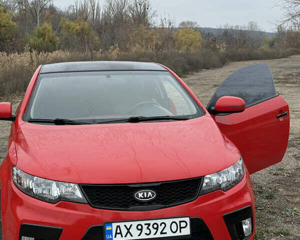 Червоний Кіа Черато, об'ємом двигуна 2 л та пробігом 124 тис. км за 8000 $, фото 2 на Automoto.ua