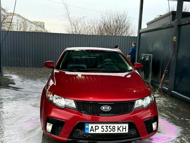 Червоний Кіа Черато, об'ємом двигуна 2 л та пробігом 201 тис. км за 7900 $, фото 3 на Automoto.ua