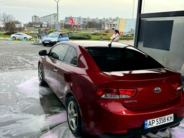 Червоний Кіа Черато, об'ємом двигуна 2 л та пробігом 201 тис. км за 7900 $, фото 4 на Automoto.ua