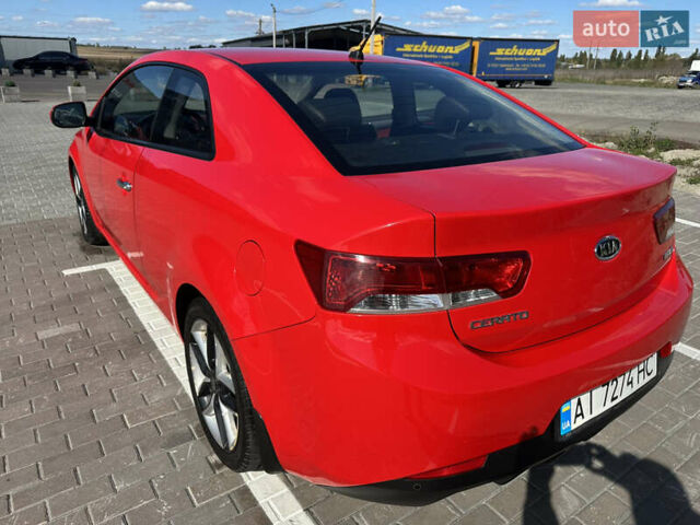 Красный Киа Черато, объемом двигателя 2 л и пробегом 160 тыс. км за 6899 $, фото 112 на Automoto.ua