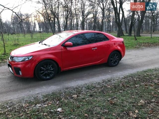 Красный Киа Черато, объемом двигателя 2 л и пробегом 230 тыс. км за 7700 $, фото 4 на Automoto.ua