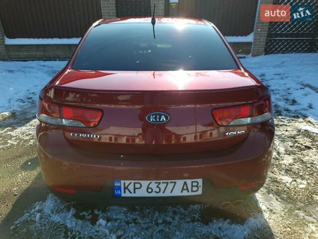 Червоний Кіа Черато, об'ємом двигуна 2 л та пробігом 200 тис. км за 8300 $, фото 1 на Automoto.ua