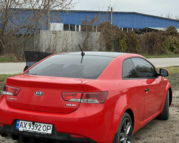Червоний Кіа Черато, об'ємом двигуна 2 л та пробігом 124 тис. км за 8000 $, фото 4 на Automoto.ua
