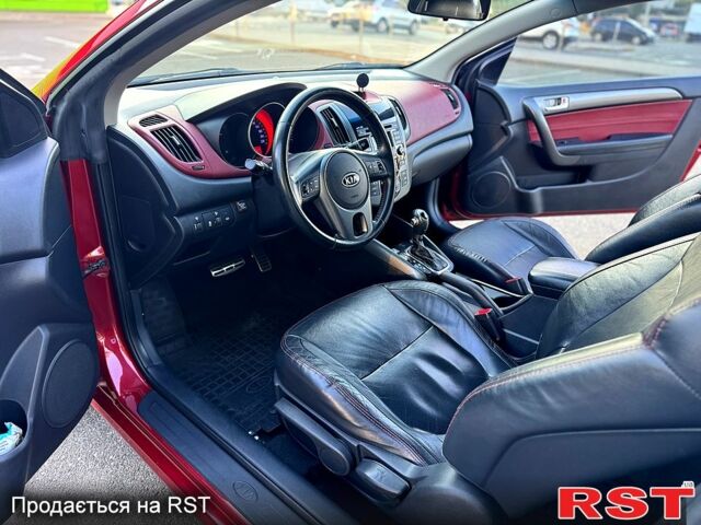 Киа Черато 2011 в Киеве на Automoto.ua Красный Киа Черато, объемом двигателя 2 л и пробегом 220 тыс. км за 7900 $, фото 3 на Automoto.ua