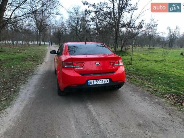 Красный Киа Черато, объемом двигателя 2 л и пробегом 230 тыс. км за 7700 $, фото 2 на Automoto.ua