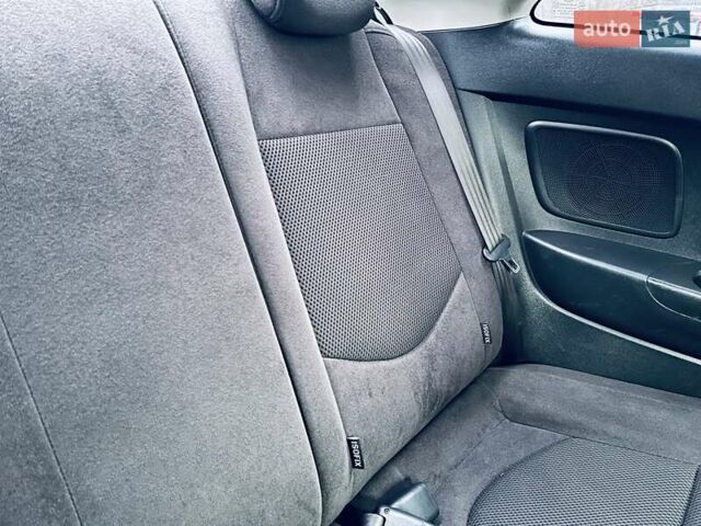 Красный Киа Черато, объемом двигателя 1.6 л и пробегом 293 тыс. км за 7100 $, фото 20 на Automoto.ua