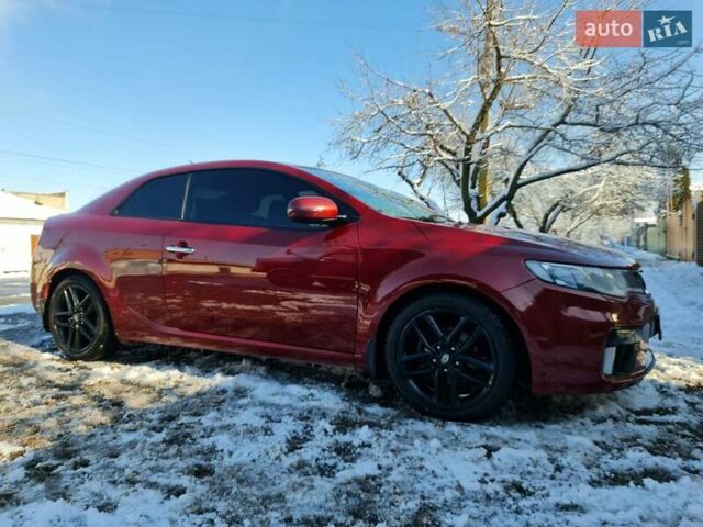 Червоний Кіа Черато, об'ємом двигуна 2 л та пробігом 200 тис. км за 8300 $, фото 33 на Automoto.ua