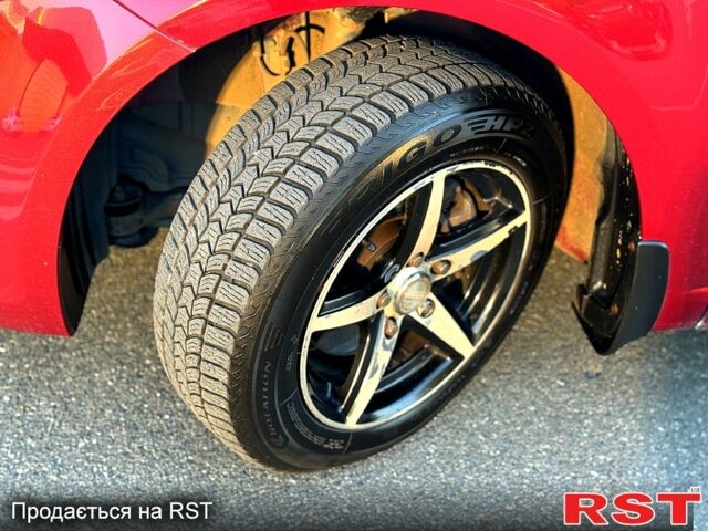 Киа Черато 2011 в Киеве на Automoto.ua Красный Киа Черато, объемом двигателя 2 л и пробегом 220 тыс. км за 7900 $, фото 9 на Automoto.ua