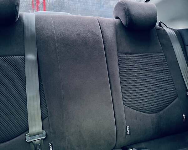 Красный Киа Черато, объемом двигателя 1.6 л и пробегом 293 тыс. км за 7100 $, фото 19 на Automoto.ua